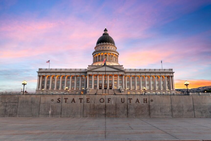 The Utah State Capitol against a sunset sky