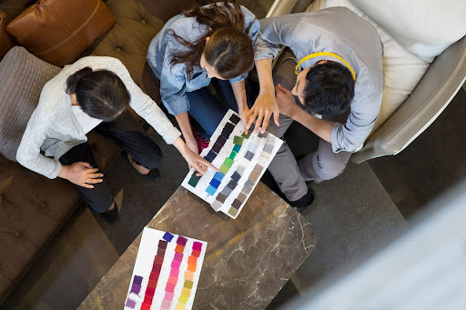 people looking at color swatches
