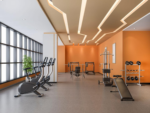 a gym with orange walls